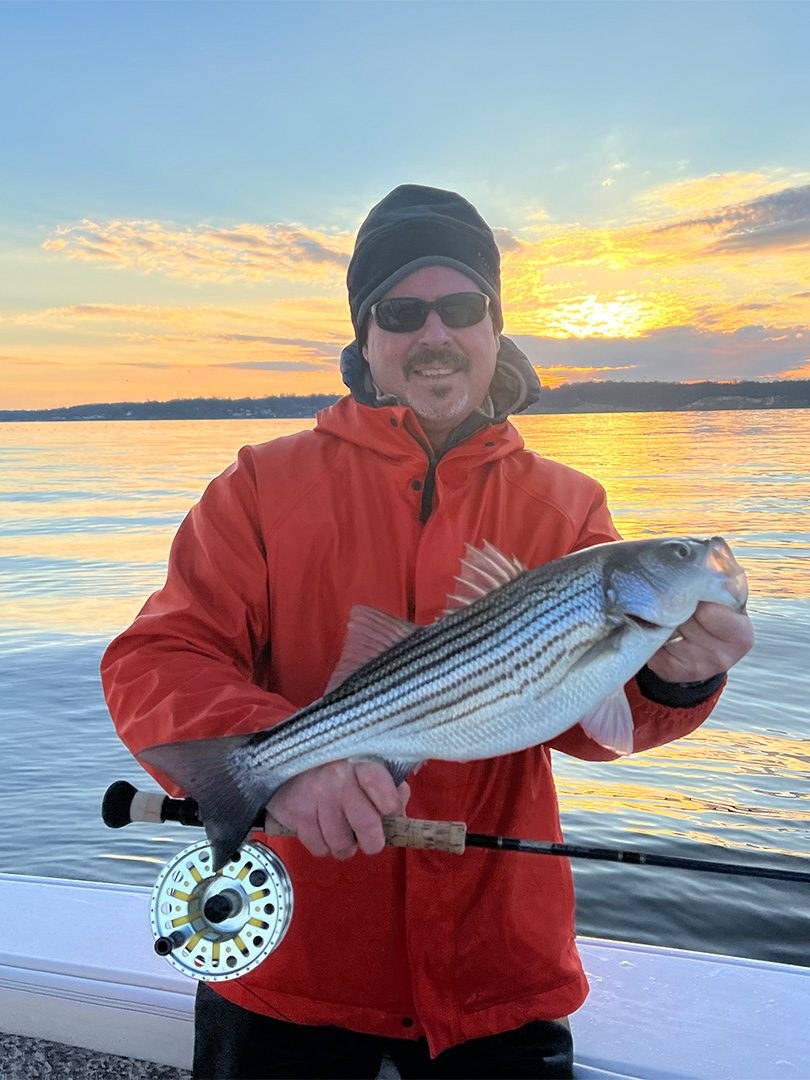 Fly angler at sunset on the Chesapeake